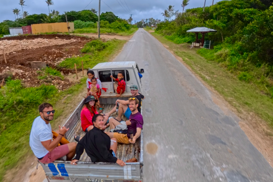 Is Tonga worth visiting? Group of 5 hitchhiking in the back of a pickup truck in tonga