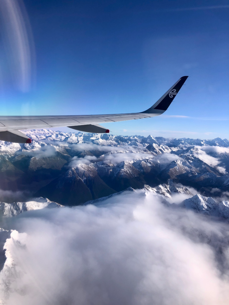 1 week south island road trip, view of the southern alps as you fly into queenstown