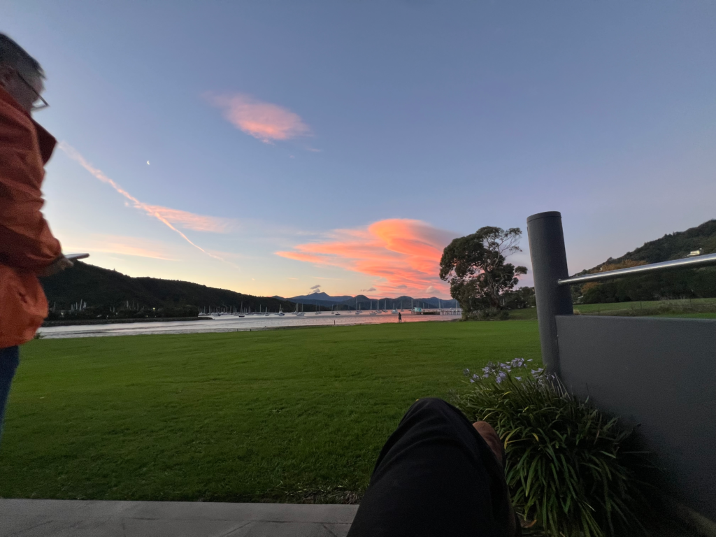 how to spend 1 perfect day in picton. sunset over the water, pink clouds in a dim blue sky