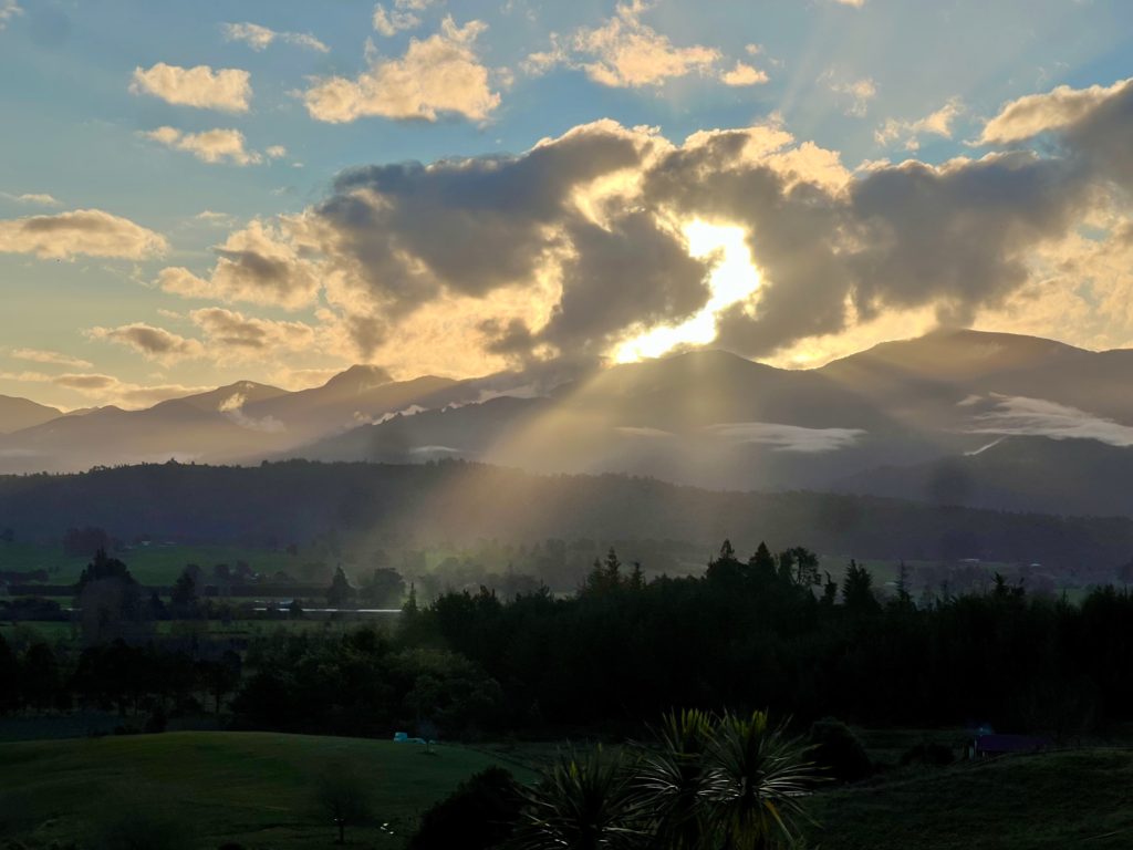 sunset through clouds